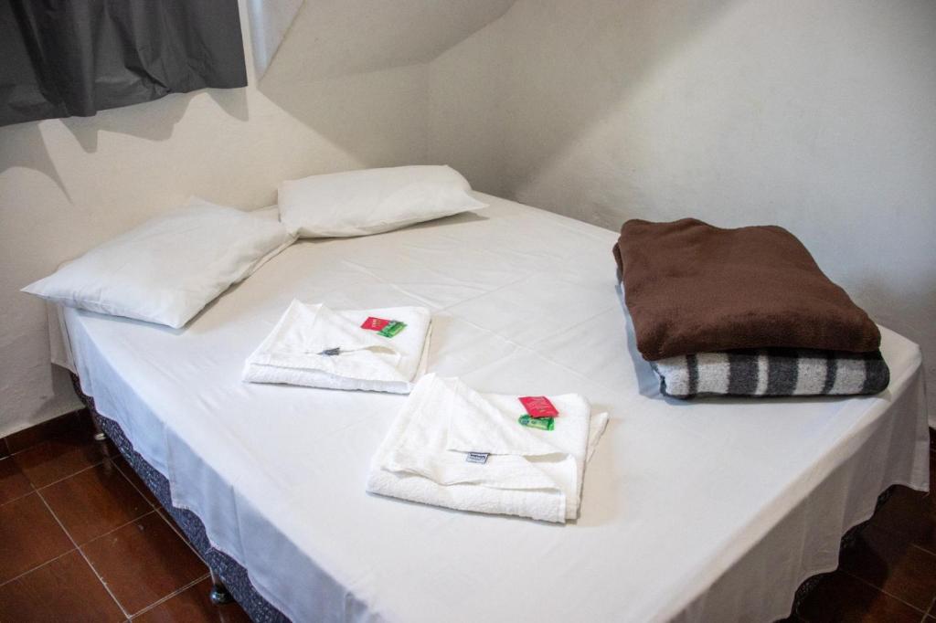 Кровать или кровати в номере Novo Hotel