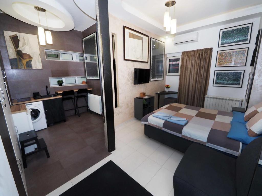 Μια τηλεόραση ή/και κέντρο ψυχαγωγίας στο KennedyLux Apartment