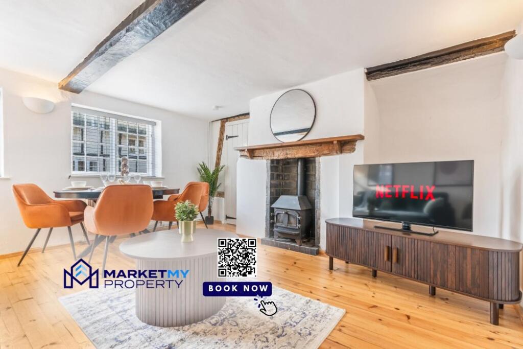 Et opholdsområde på Stylish 3-Bed Cottage Stay in Streatley