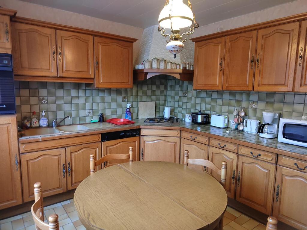 Køkken eller tekøkken på Gîte familial avec salle de jeux