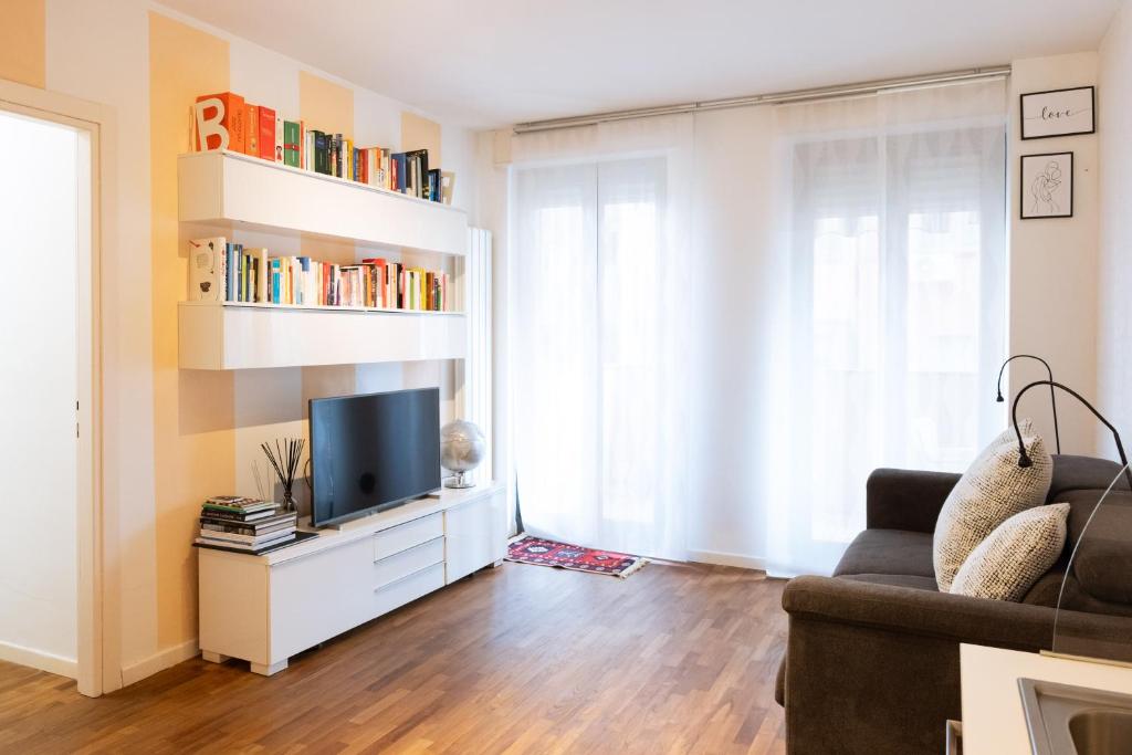 Et tv og/eller underholdning på Ampio e accogliente Bilocale in zona Bicocca