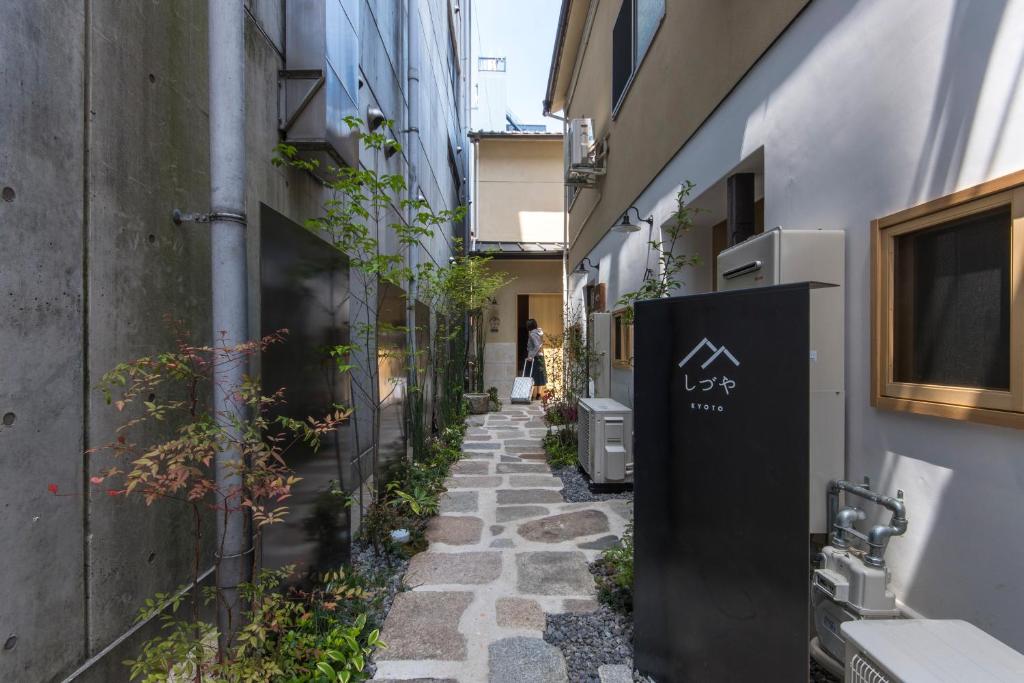 a small alleyway between two buildings at Shizuya KYOTO in Kyoto