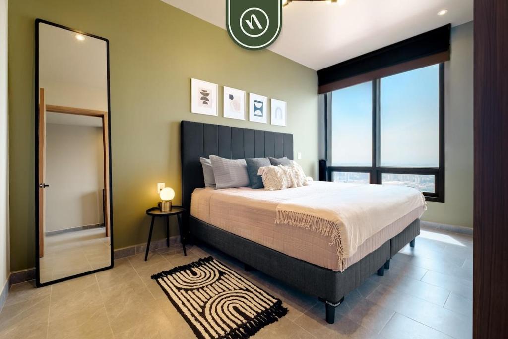 Ένα ή περισσότερα κρεβάτια σε δωμάτιο στο Amazing 1 BR Condo in Reforma - Pool - Gym - King