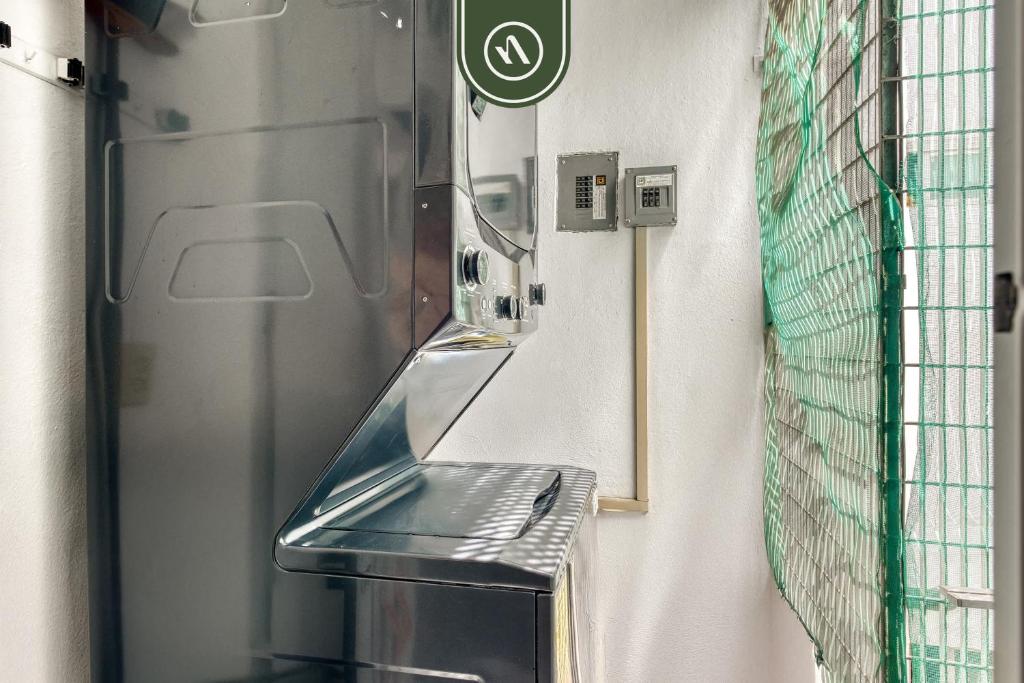 a stainless steel staircase in a subway train at Centric 2 BR Condo - Roma - Rio de Janeiro Park in Mexico City