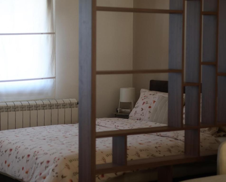 Ένα ή περισσότερα κρεβάτια σε δωμάτιο στο Apartment 11