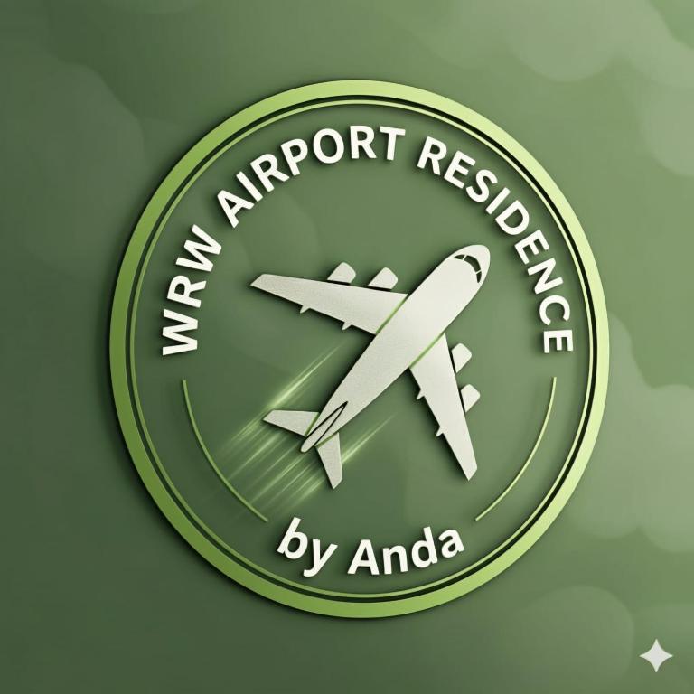 a green merit badge with an airplane on it at WRW Airport Residence in Otopeni