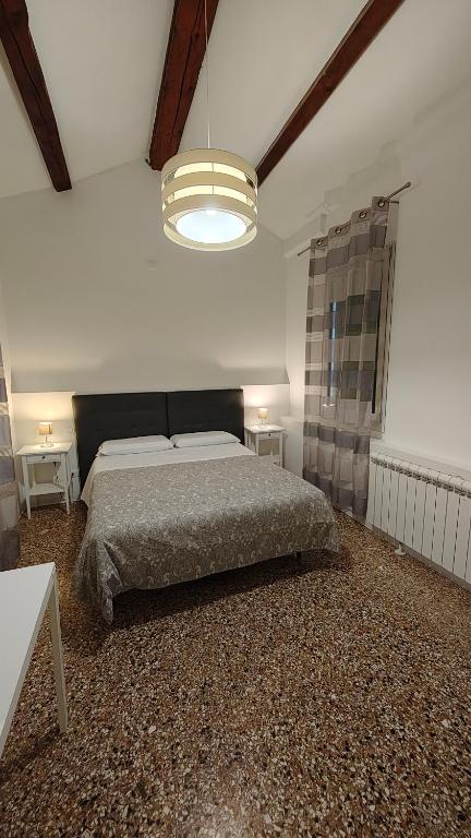 Postel nebo postele na pokoji v ubytování Corte Loredana