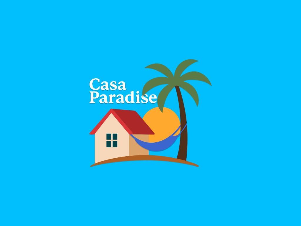 a house and a palm tree and the words casa paradise at Casa Paradise in Jijoca de Jericoacoara