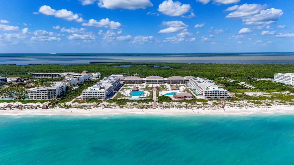 an aerial view of a resort on the beach at Ocean Allure Costa Mujeres - Adults Only - All Inclusive in Costa Mujeres