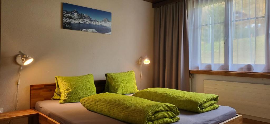 Un pat sau paturi într-o cameră la Tgèsa Val