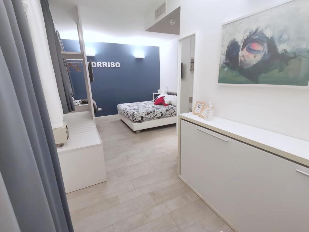 Ένα ή περισσότερα κρεβάτια σε δωμάτιο στο Hotel Madalù