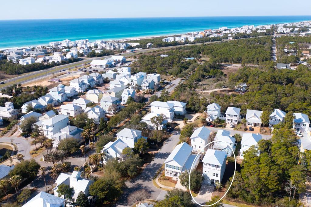 an aerial view of a residential neighborhood with the beach at Fishers SeaBREEze Starfish in Inlet Beach