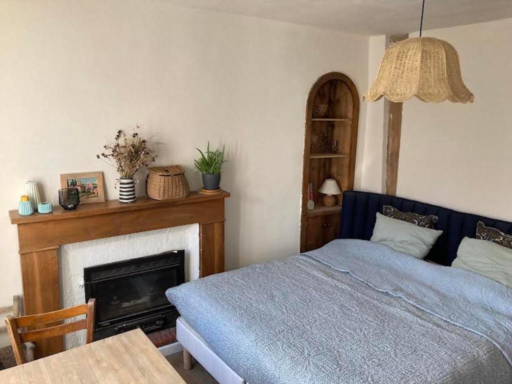 Postel nebo postele na pokoji v ubytování Ô Mon Aubrac