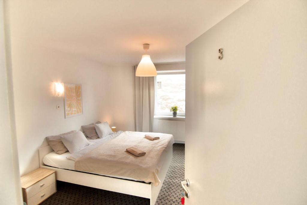 Ένα ή περισσότερα κρεβάτια σε δωμάτιο στο City centre - Room 3 with shared bathroom