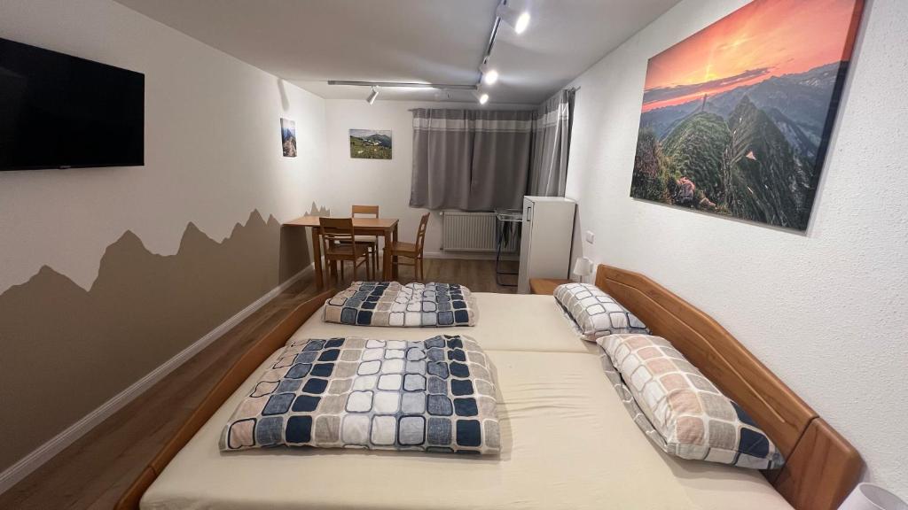 Ένα ή περισσότερα κρεβάτια σε δωμάτιο στο Mellau Appartments 220