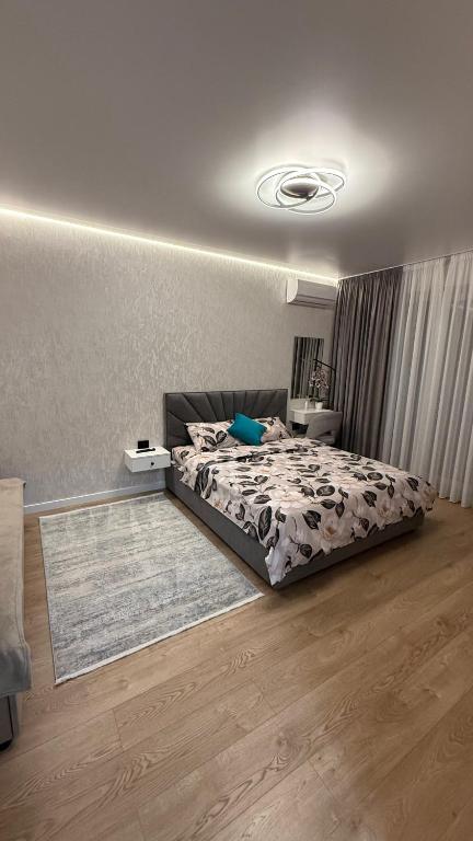 Postel nebo postele na pokoji v ubytování Люкс апартамент ЦЕНТР