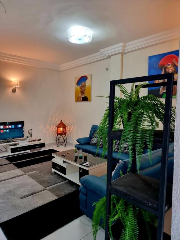 Postel nebo postele na pokoji v ubytování Appartmeublé , Cotonou