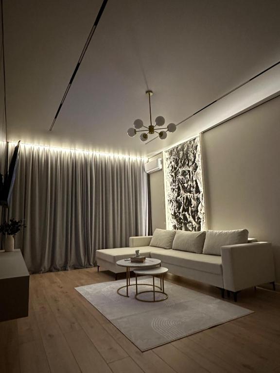 Posezení v ubytování Luxury Apartment in Buqar Jyrau