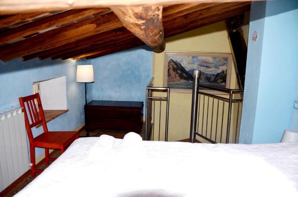 Postel nebo postele na pokoji v ubytování Beppe's house