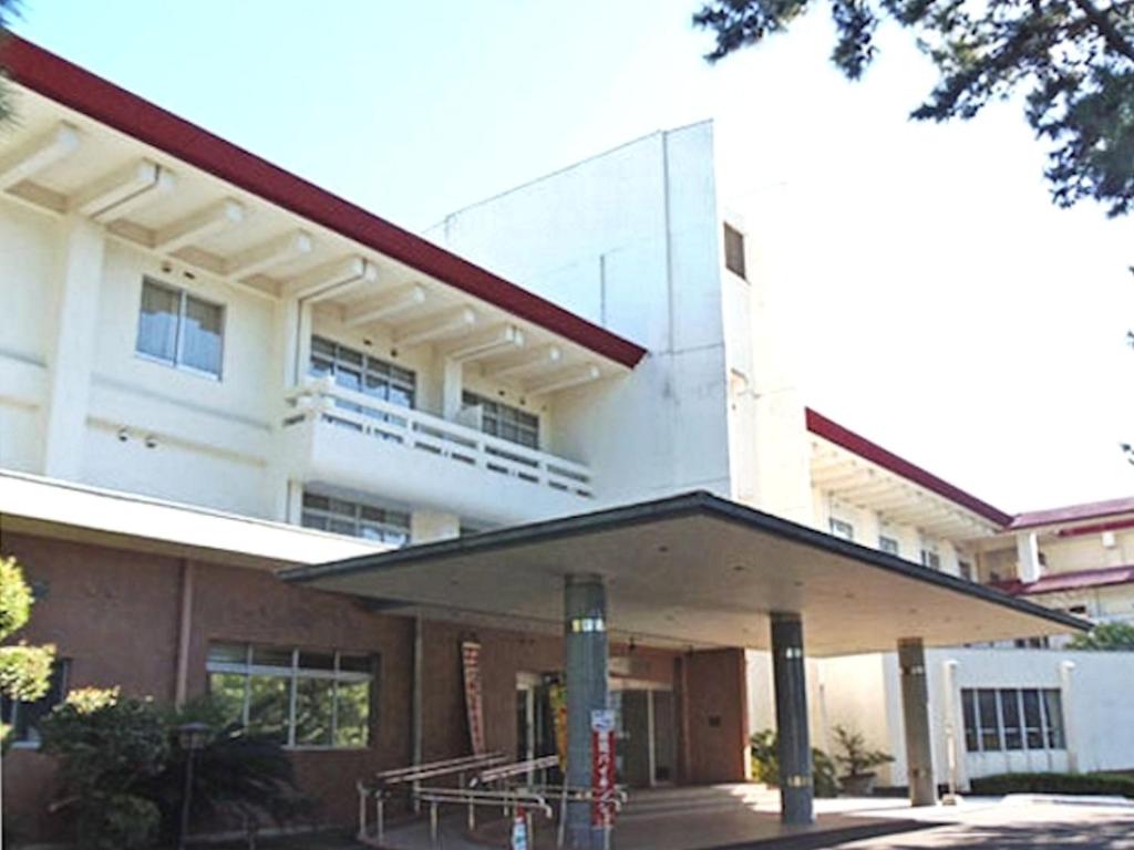 a view of a building with a building at Hotel Axia Kushikino in Ichikikushikino