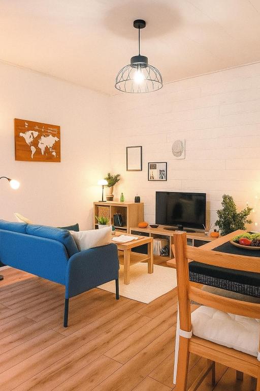 TV a/nebo společenská místnost v ubytování Appartement chaleureux