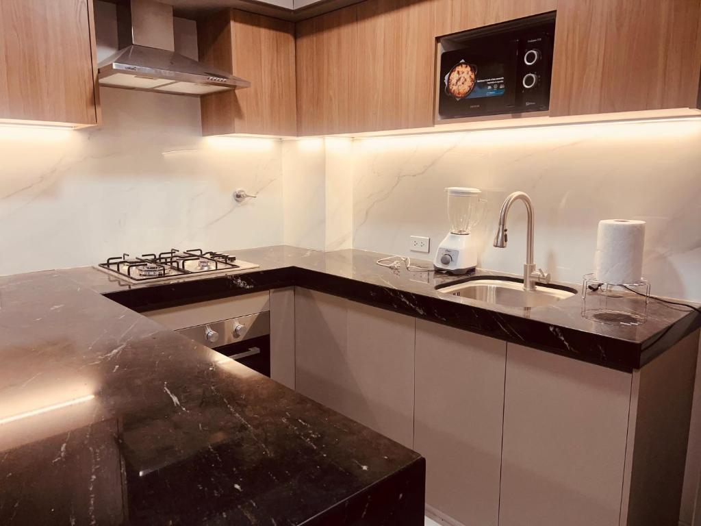 Nhà bếp/bếp nhỏ tại AT Apart Equipetrol