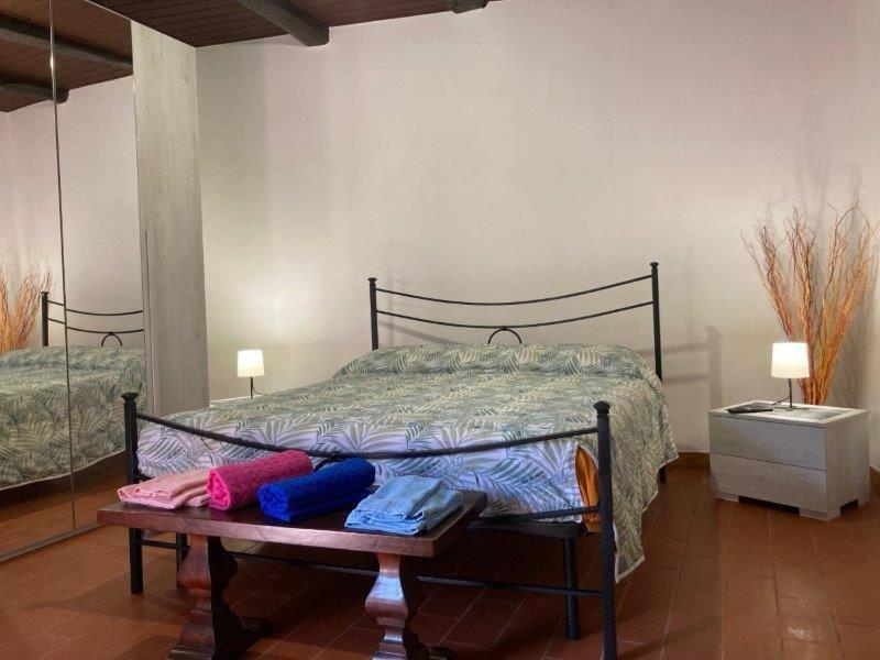 Ένα ή περισσότερα κρεβάτια σε δωμάτιο στο B&B La Suite di Alba