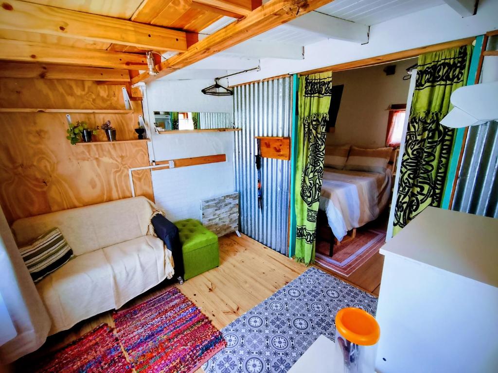 Postel nebo postele na pokoji v ubytování Casa Nido Tiny House