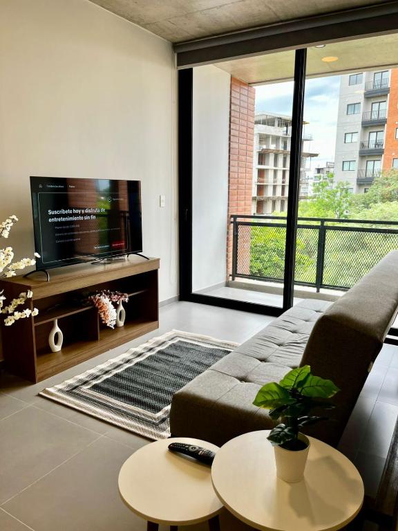 TV a/nebo společenská místnost v ubytování Asuncion Venire