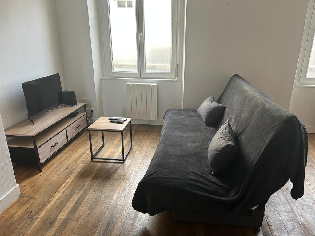 Μια τηλεόραση ή/και κέντρο ψυχαγωγίας στο Appartement avec terrasse