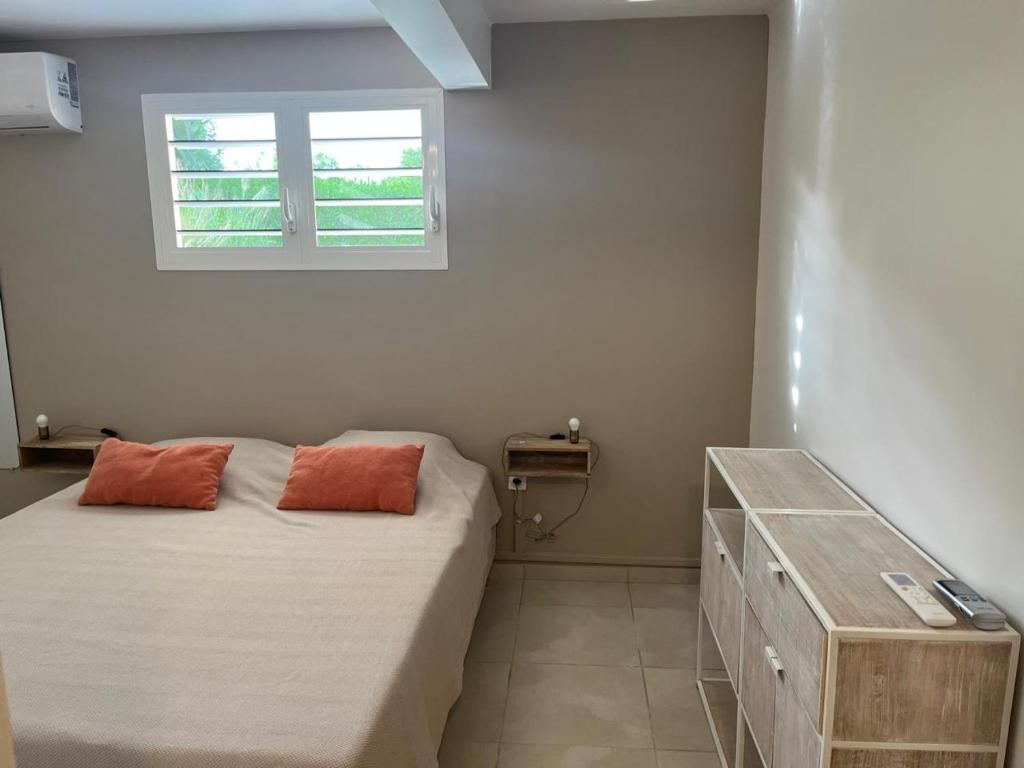 Postel nebo postele na pokoji v ubytování Blue Garden A 2 pas des plages