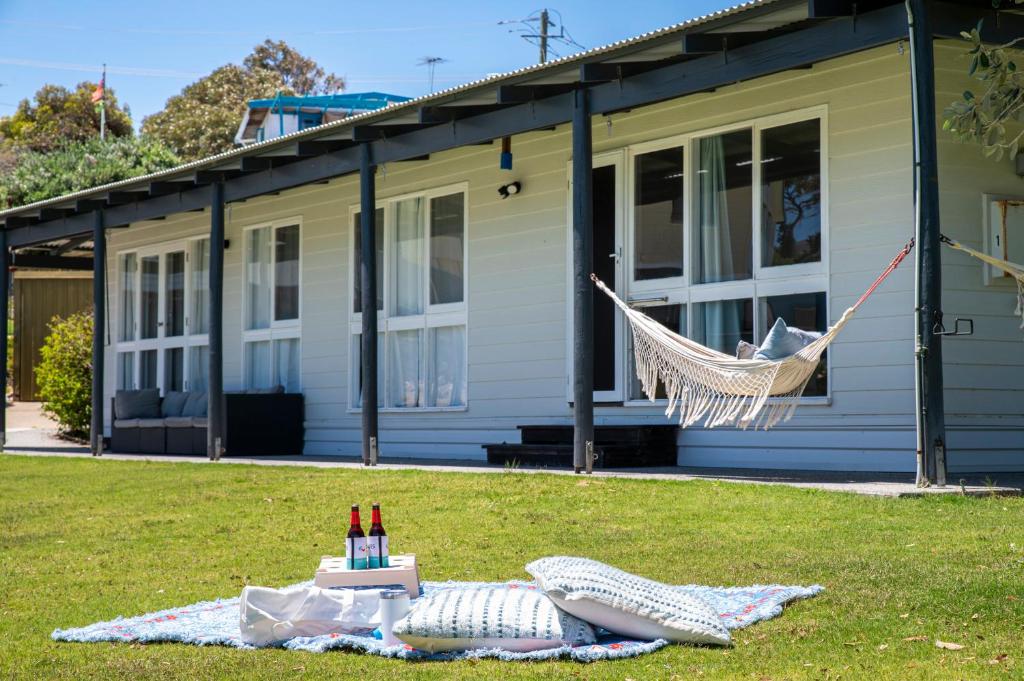 a hammock in a yard next to a house at Buena Vista in Guilderton