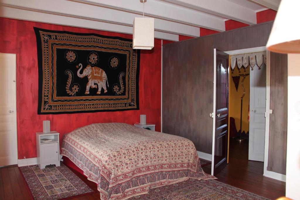 Postel nebo postele na pokoji v ubytování Chambres d'hôtes Manoir du Buquet