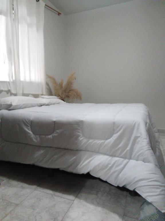 Ένα ή περισσότερα κρεβάτια σε δωμάτιο στο Pousada São Jorge