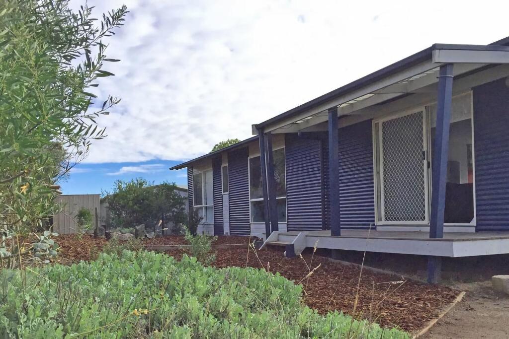 a row of modular homes in a garden at Eastgarth in Venus Bay