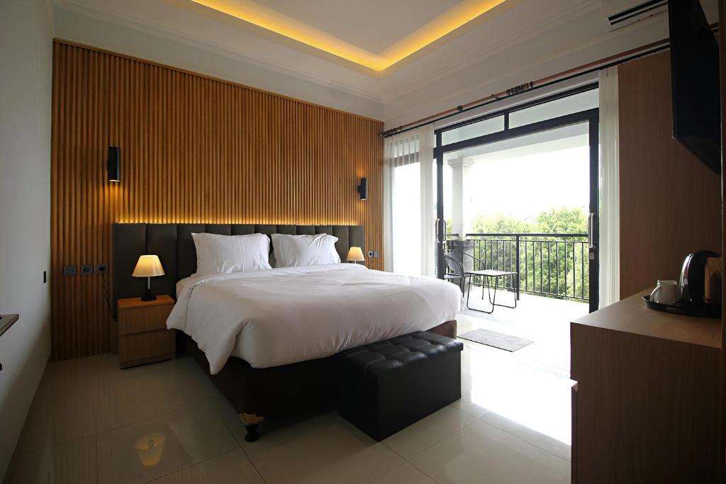 Ένα ή περισσότερα κρεβάτια σε δωμάτιο στο Sabda Alam Agro & Farmstay