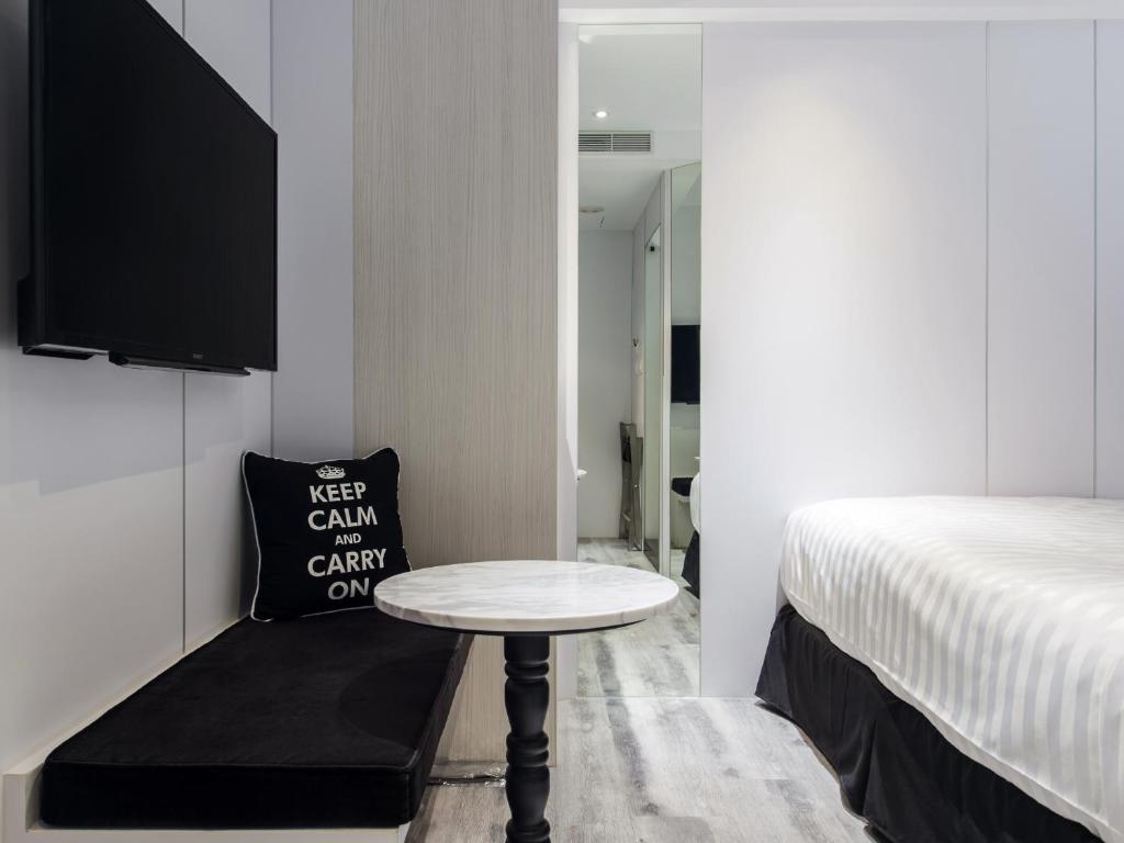 Voodi või voodid majutusasutuse Hotel Relax III toas