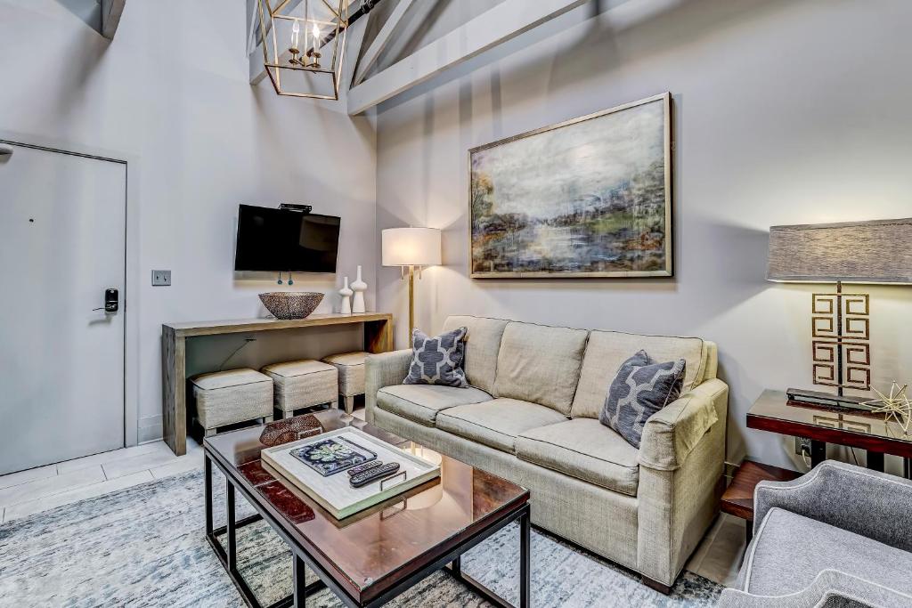 a living room with a couch and a table at Parker's Collection Unit 5 in Savannah