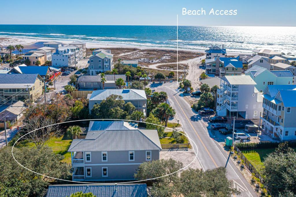 an aerial view of a beach town with houses and the ocean at IncogBeachO in Santa Rosa Beach