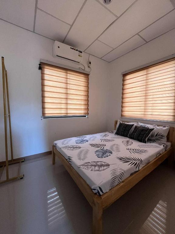 Ένα ή περισσότερα κρεβάτια σε δωμάτιο στο Quiet and Serene Environment at Casa Aemilia