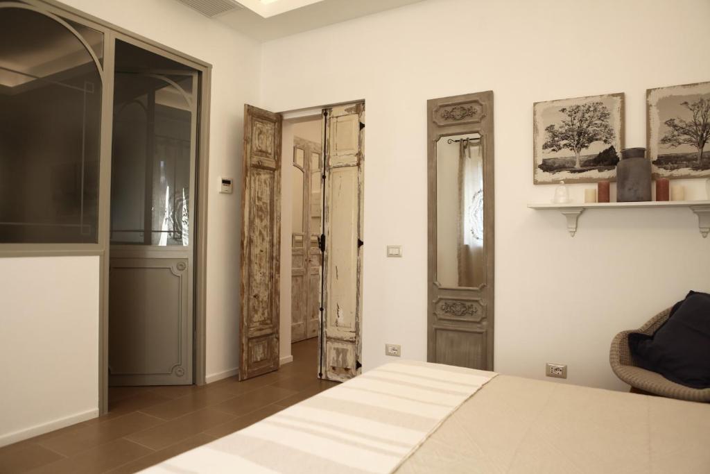 Postel nebo postele na pokoji v ubytování Casa Fioravanti