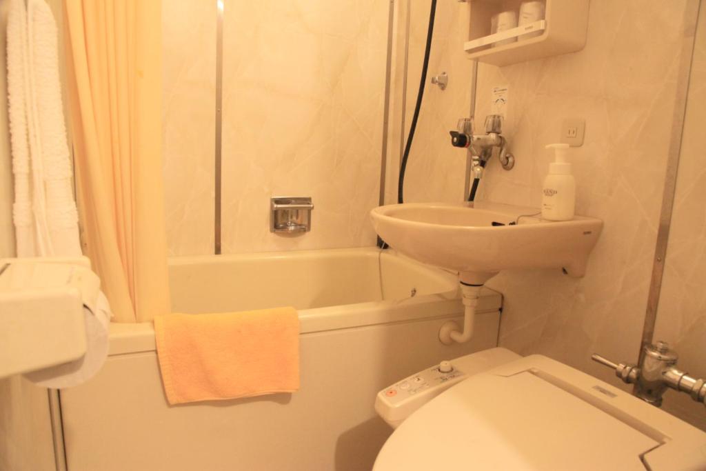Koupelna v ubytování Hotel New Kotobuki