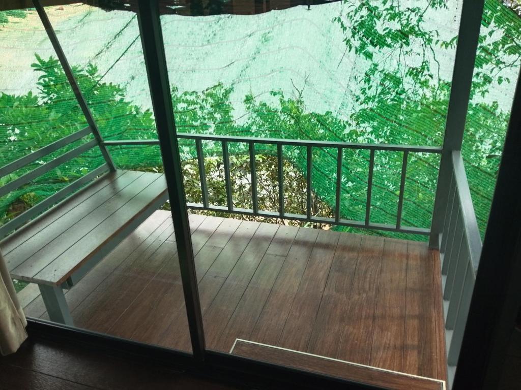 a view from the balcony of a house at The Big House in Ranong