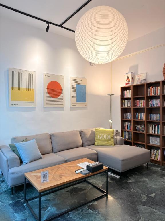 a living room with a couch and a coffee table at 衛民家 wei min home in Tainan