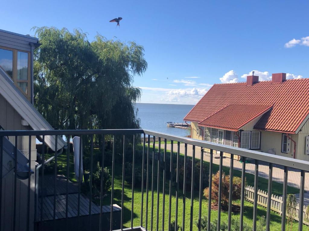 a view of the ocean from the balcony of a house at Laimes kopa Pervalka in Pervalka