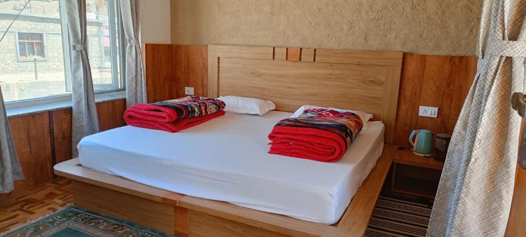 Voodi või voodid majutusasutuse Juniper Home Kaza by Mountain Bee toas