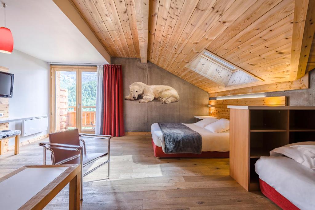 Postel nebo postele na pokoji v ubytování Anova Hotel & Spa