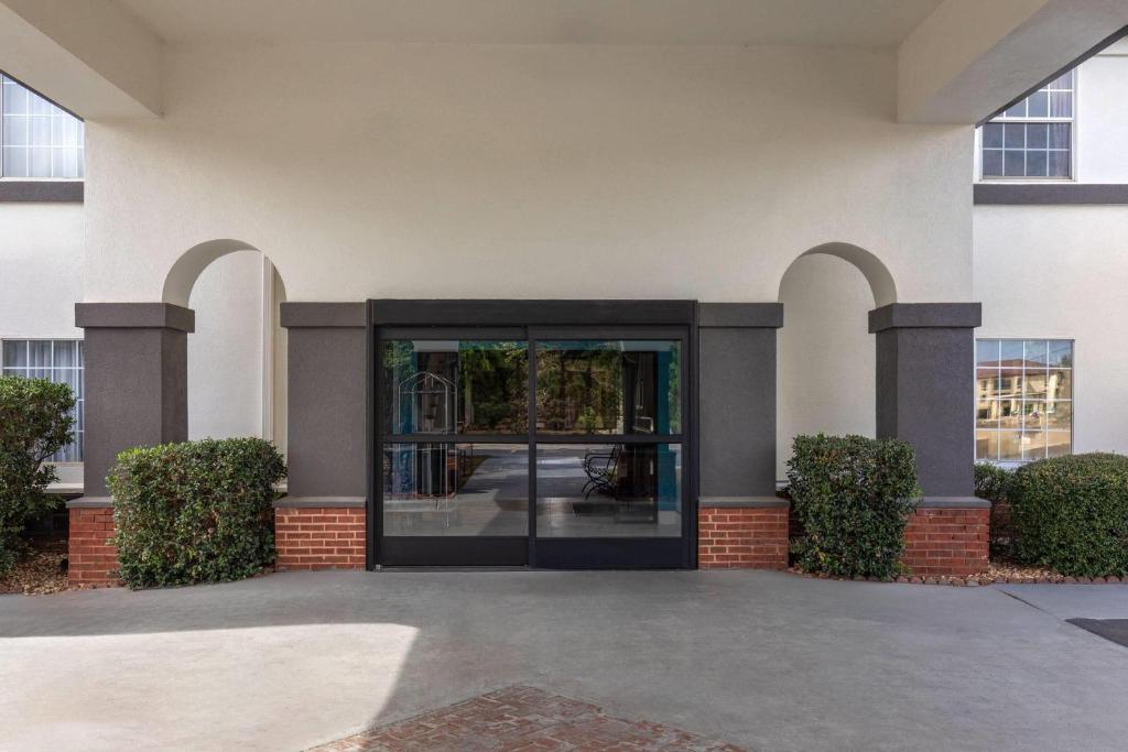 an entry to a building with a glass door at Days Inn by Wyndham Lincoln in Lincoln