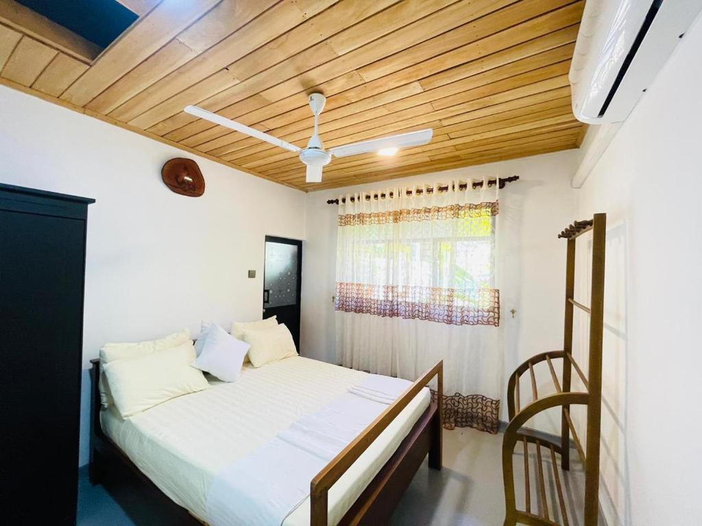 Postel nebo postele na pokoji v ubytování Villa Climax