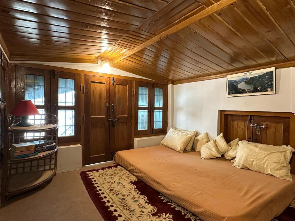 Voodi või voodid majutusasutuse Mountain Retreat Nainital toas